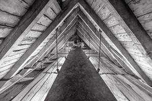 View of upper attic above clapboard floor of the cockloft